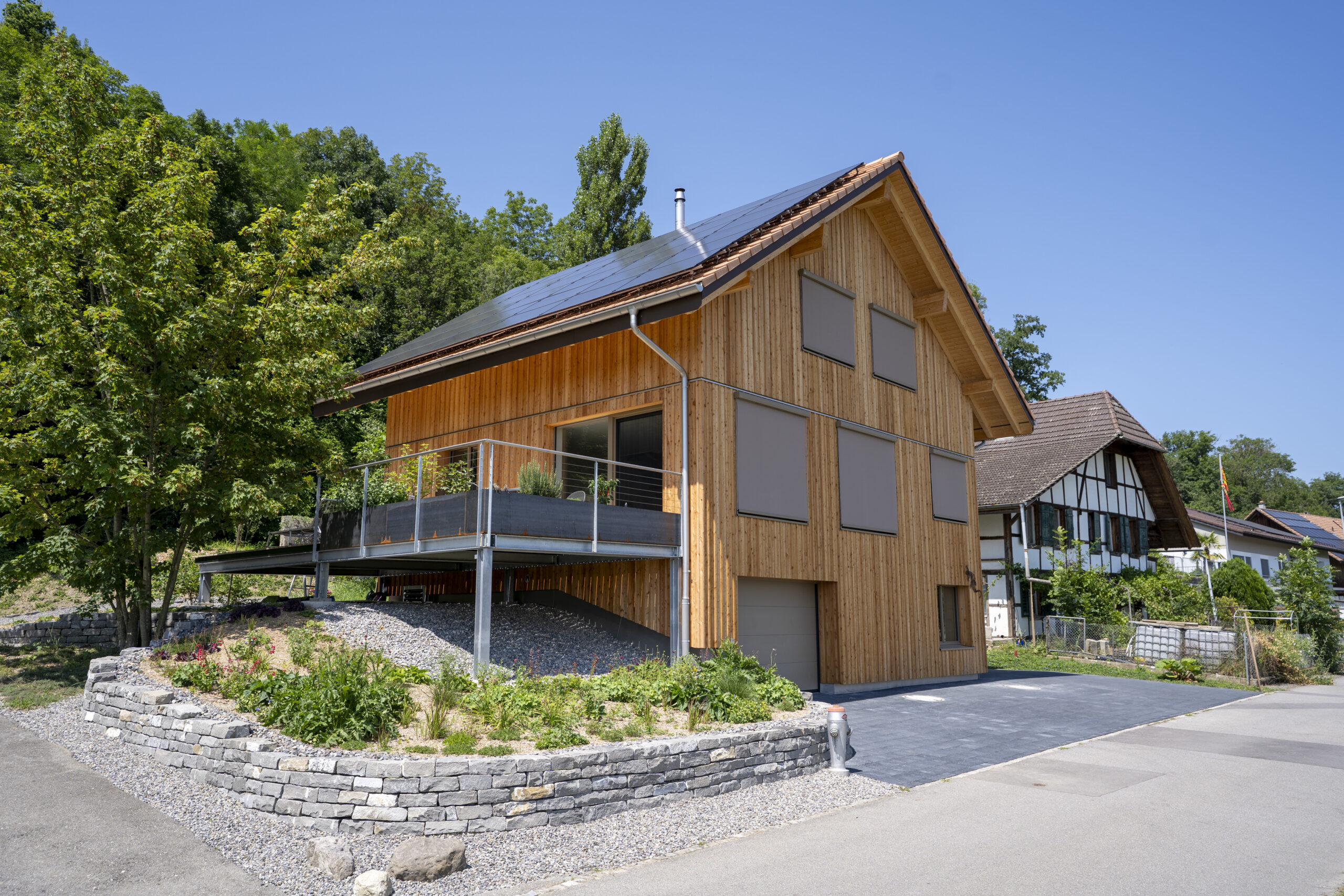 Einfamilienhaus Fassade / Innenausbau / Dachkonstruktion